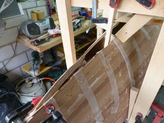 Boat ends are closed - stripping the bottom begins
