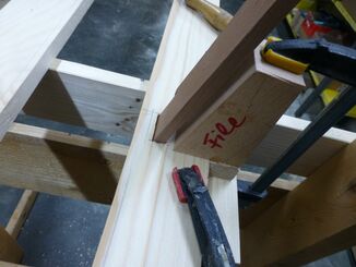 Checking a mortise hole with a hardwood tenon sample